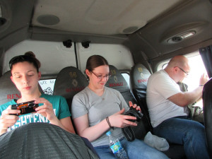During the ride to Ilo, WCC students check their pictures and snap a few more out the van's windows. During the ride to Ilo, WCC students check their pictures and snap a few more out the van's windows.