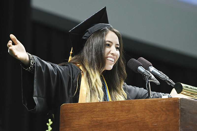 Commencement student speaker Paula Salazar addresses her fellow Washtenaw Community College graduates. | Photo by Lon Horwedel